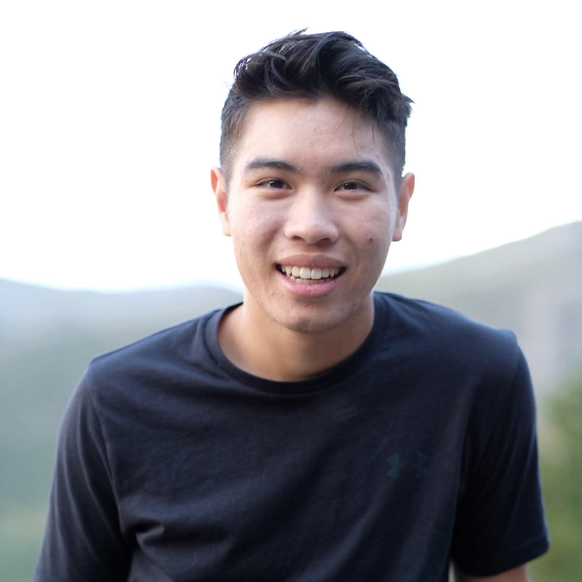 Liem Tran smiling outdoors